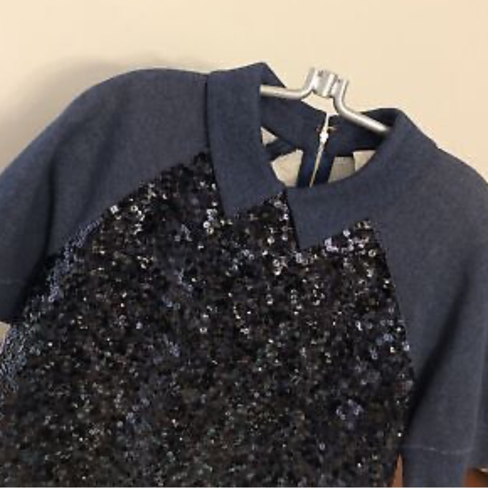 Kate Spade sz L Milo navy sequined SS top

New without rates. Never Worn